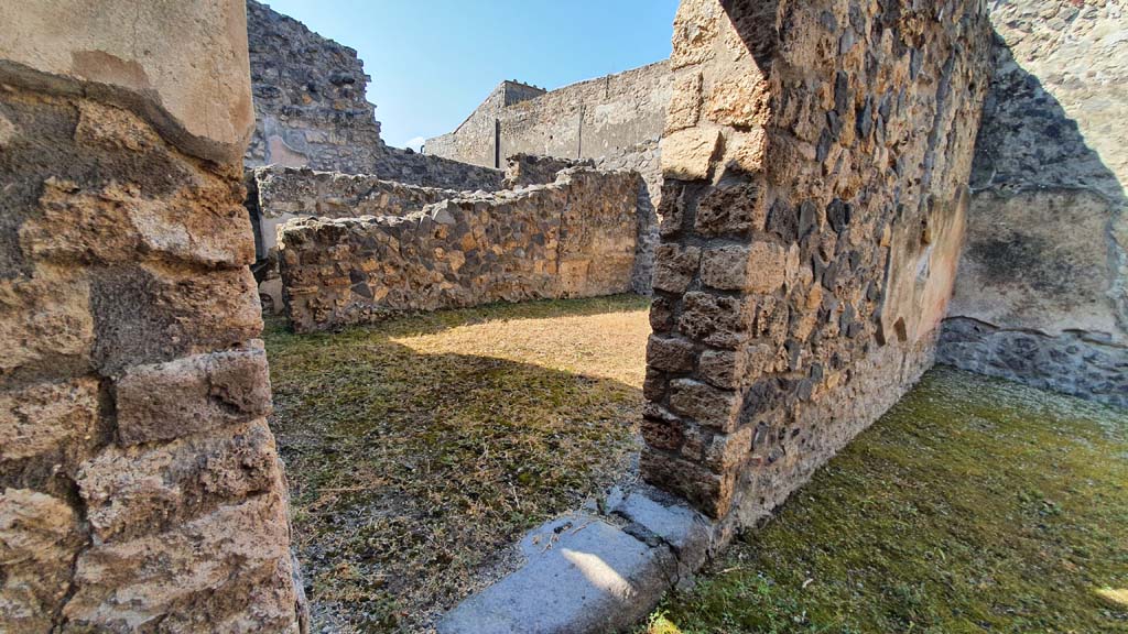 I.11.1 Pompeii. July 2021. Doorway in south wall of bar-room leading into another room, perhaps used by the customers. 
Foto Annette Haug, ERC Grant 681269 DÉCOR.

