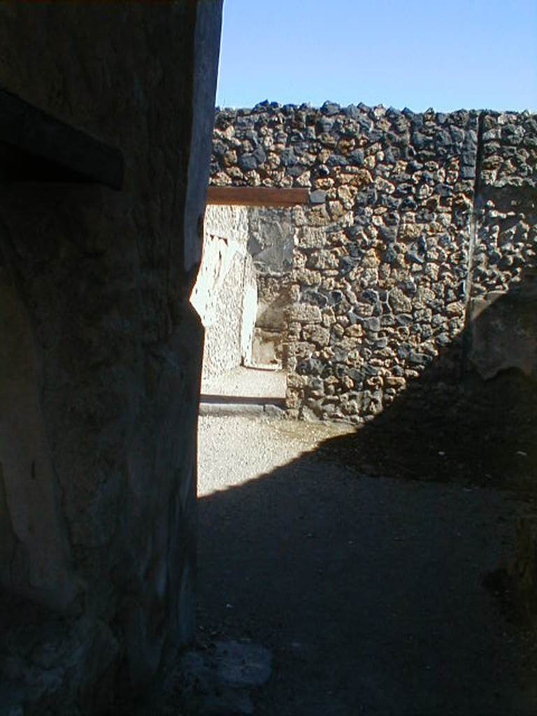 I.11.1 Pompeii. May 2005. Looking across bar-room and into room to the south.
