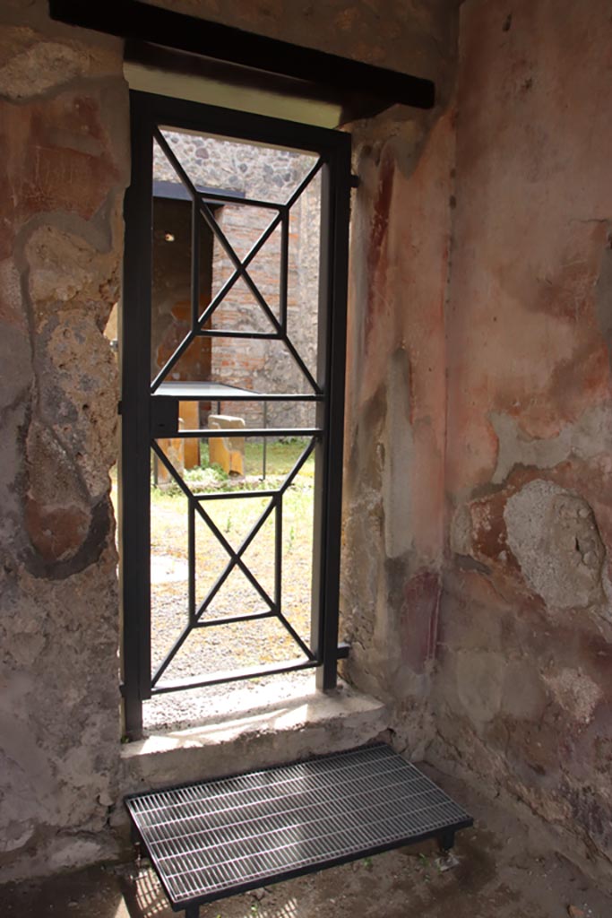 I.11.7 Pompeii. May 2024. 
Doorway in south wall into atrium of I.11.6. Photo courtesy of Klaus Heese.
