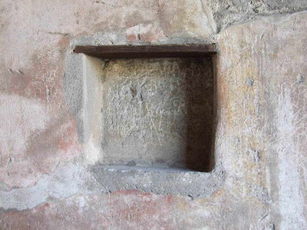 I.11.7 Pompeii. December 2006. Niche in west wall.