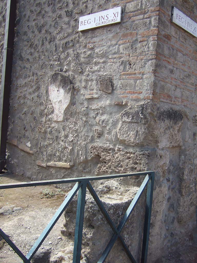 I.11.7 Pompeii. September 2005. Street altar on north-east corner of insula.
According to Della Corte, because of the poor state of the sacred painting when it was found, he could not know to which divinity it was dedicated.
See Della Corte, M., 1965. Case ed Abitanti di Pompei. Napoli: Fausto Fiorentino. (p. 343-4).
