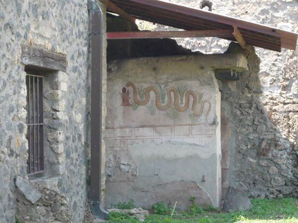 I.11.11 Pompeii. May 2012. Looking north to lararium. Photo courtesy of Buzz Ferebee.