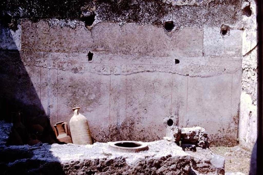 I.11.11 Pompeii. 1964. Looking across counter to west wall of bar-room, which would have had supports for wooden shelving or racks. Photo by Stanley A. Jashemski.
Source: The Wilhelmina and Stanley A. Jashemski archive in the University of Maryland Library, Special Collections (See collection page) and made available under the Creative Commons Attribution-Non Commercial License v.4. See Licence and use details. J64f1857

