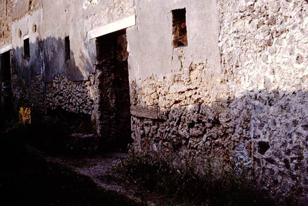 I.11.12 Pompeii. 1964. Entrance doorway on east side of unnamed vicolo between I.9 and I.11.  Photo by Stanley A. Jashemski.
Source: The Wilhelmina and Stanley A. Jashemski archive in the University of Maryland Library, Special Collections (See collection page) and made available under the Creative Commons Attribution-Non Commercial License v.4. See Licence and use details.
J64f1973
