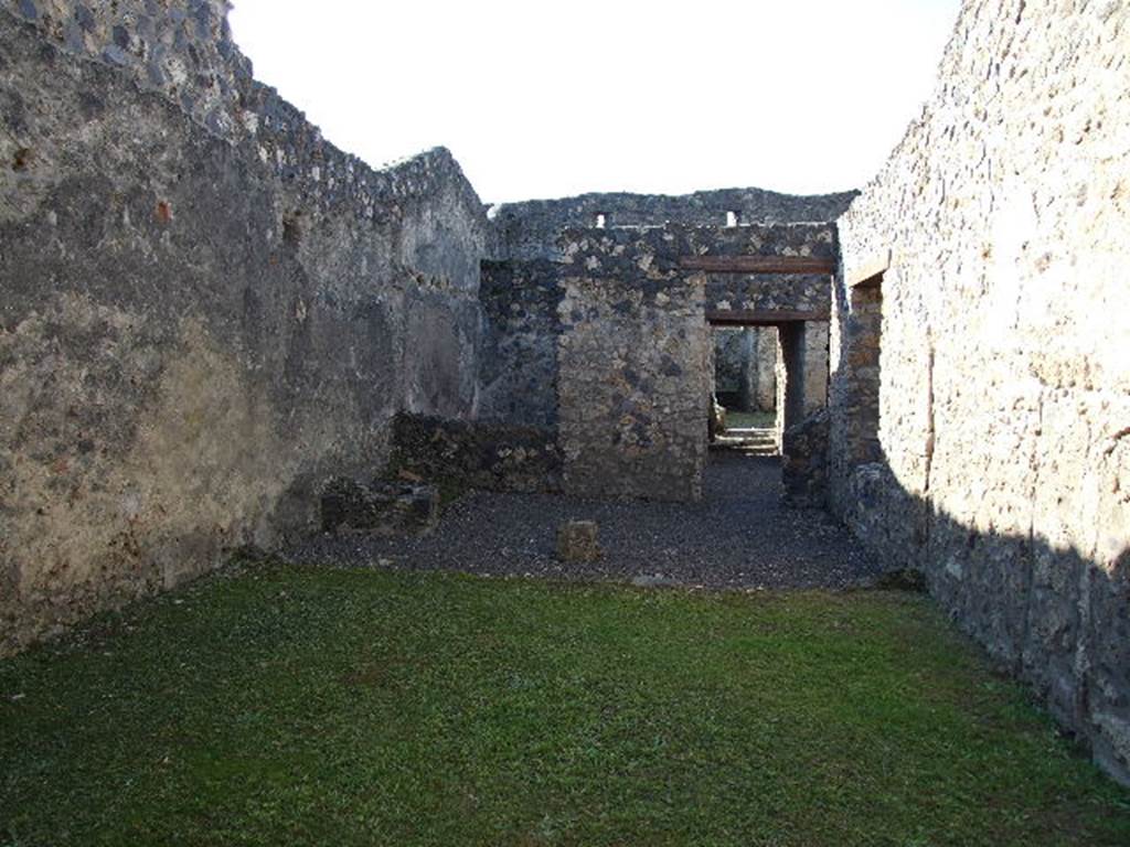 I.11.13 Pompeii. December 2006. Looking west from garden towards area of west portico, and front of house.