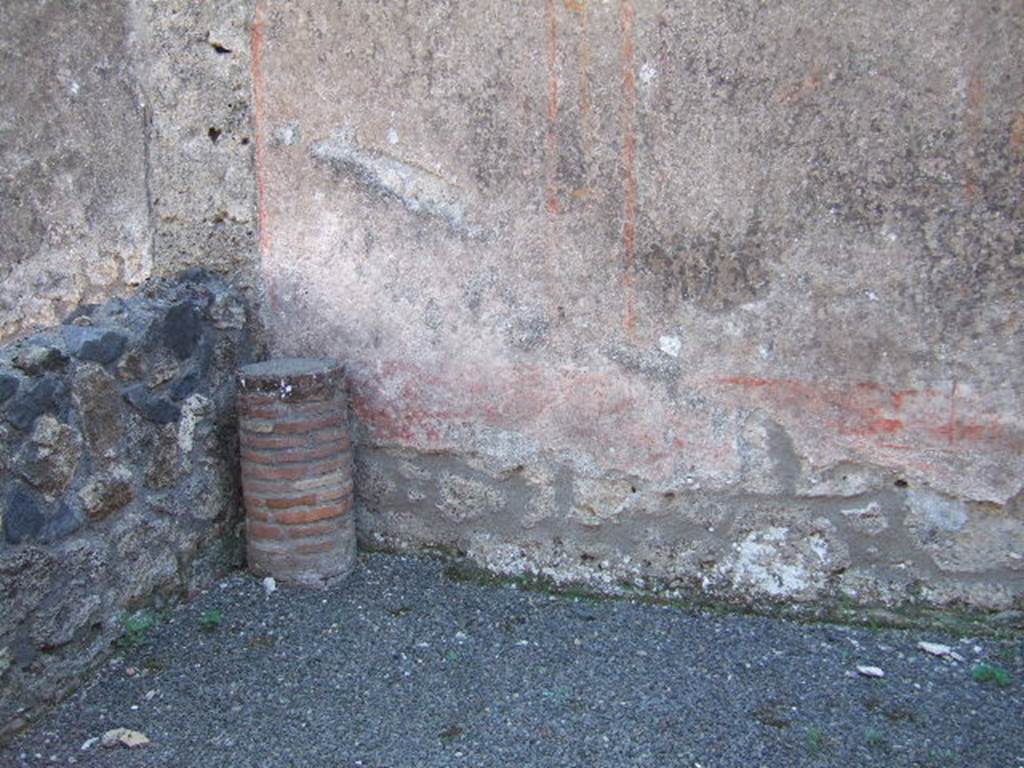 I.11.13 Pompeii. September 2005. South-east corner of room on south side of atrium, with window onto garden.