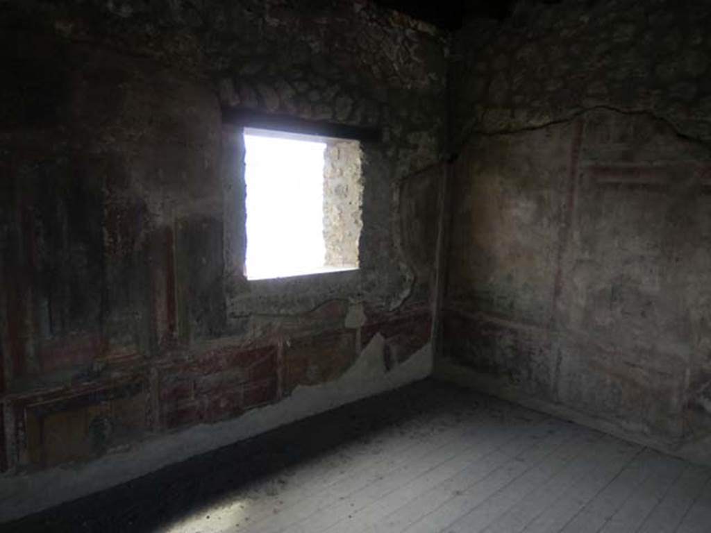 I.11.15 Pompeii. April 2012. Room 18, looking towards south-east corner, and window in east wall. Photo courtesy of Marina Fuxa.