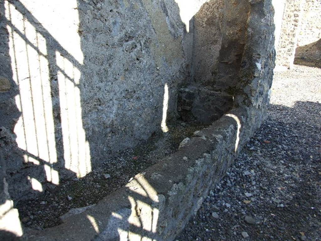 I.11.15 Pompeii. December 2006. Room 2, looking east towards latrine in storeroom, on north of entrance.