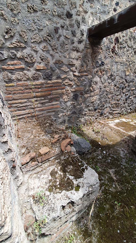 I.11.16 Pompeii. July 2021. 
Kitchen area 10, looking east on east side of doorway towards base for stairs. 
Foto Annette Haug, ERC Grant 681269 DÉCOR.
