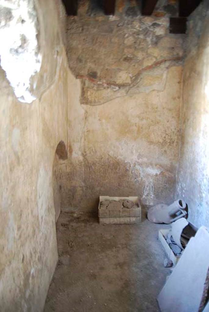 I.11.16 Pompeii. May 2103. Room 7A, looking south towards far end of room. 
Photo courtesy of Paula Lock. According to Packer, the restored ceiling is 2.70m above the floor level, and there is a low arched bed niche in the south-east corner.
