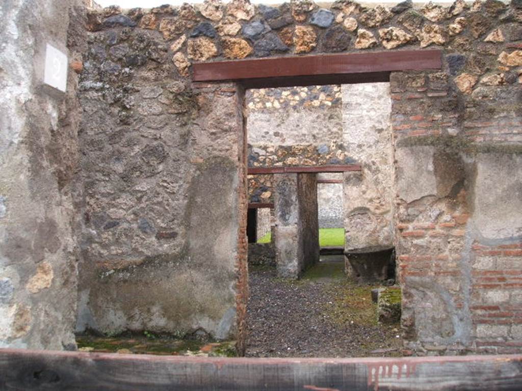 I.12.1 and I.12.2 Pompeii. December 2004. Looking south into room 4, from room 1.