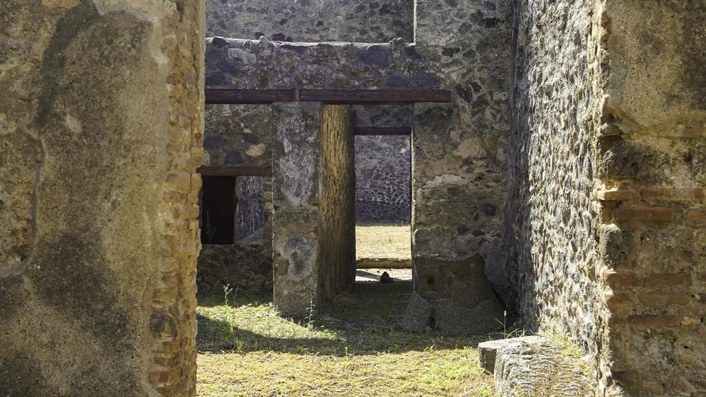 I.12.1 and I.12.2 Pompeii. August 2021. Looking south into room 4, from room 1. Photo courtesy of Robert Hanson.