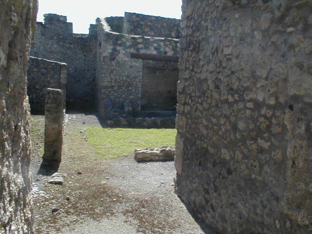 I.12.6 Pompeii. May 2005. Looking west across peristyle.