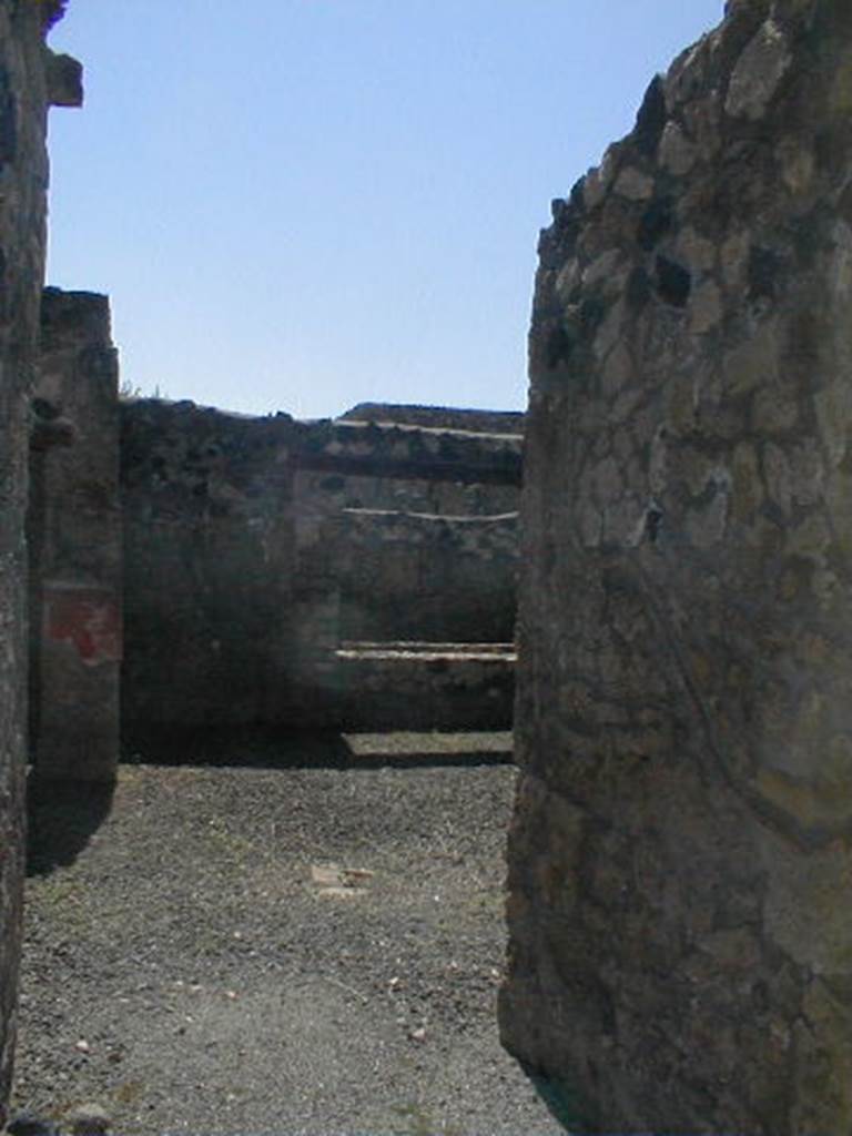 I.12.7 Pompeii. May 2005. Looking west across atrium.