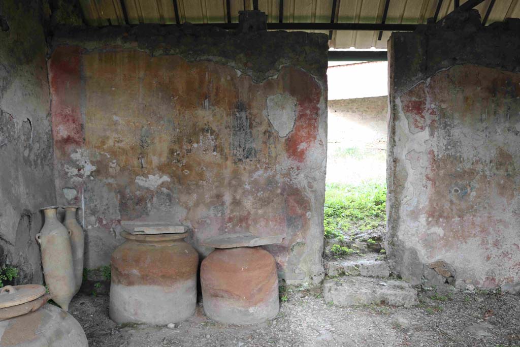 I.12.8 Pompeii. December 2018. 
Room 9, looking towards north wall with garden painting, on west side of doorway to room 13, rear garden. Photo courtesy of Aude Durand.
