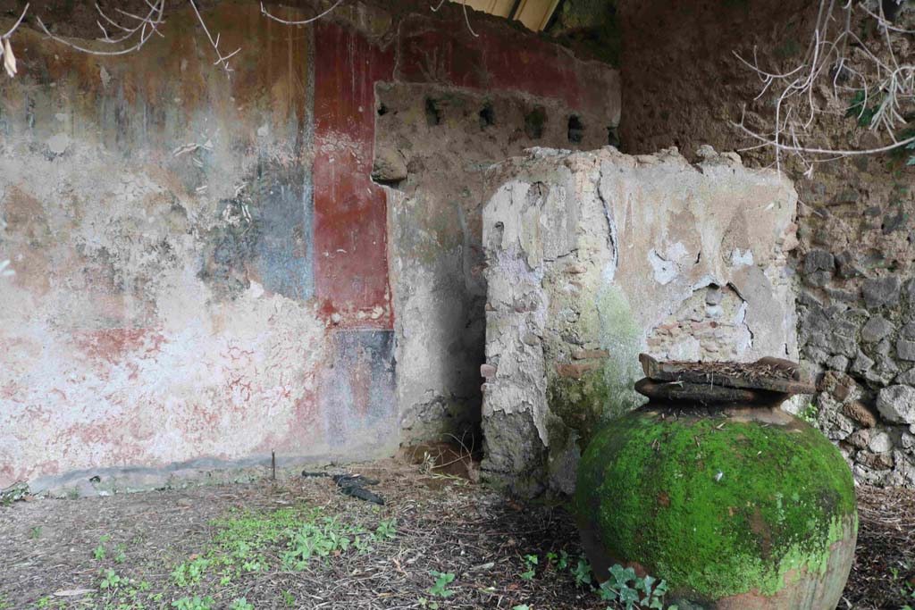 I.12.8 Pompeii. December 2018. Room 9, north-east corner of peristyle garden, looking north towards doorway to room 12.
Photo courtesy of Aude Durand.
