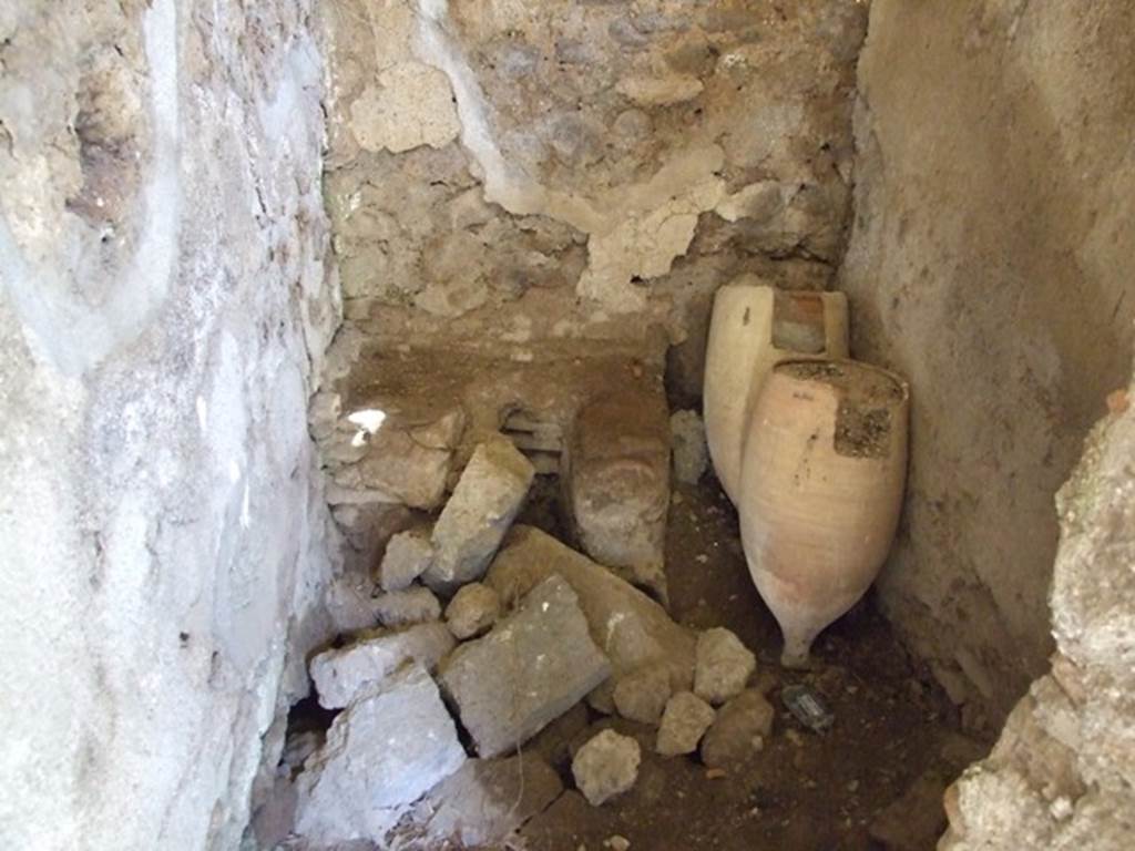 I.12.8 Pompeii.  March 2009.  Room 12. Latrine. Looking east.