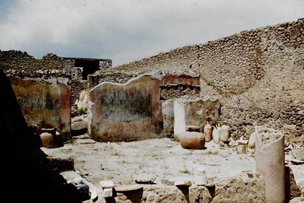 I.12.8 Pompeii. 1961.  Room 9, looking across peristyle towards north wall and north-east corner. Photo by Stanley A. Jashemski.
Source: The Wilhelmina and Stanley A. Jashemski archive in the University of Maryland Library, Special Collections (See collection page) and made available under the Creative Commons Attribution-Non Commercial License v.4. See Licence and use details.
J61f0553
