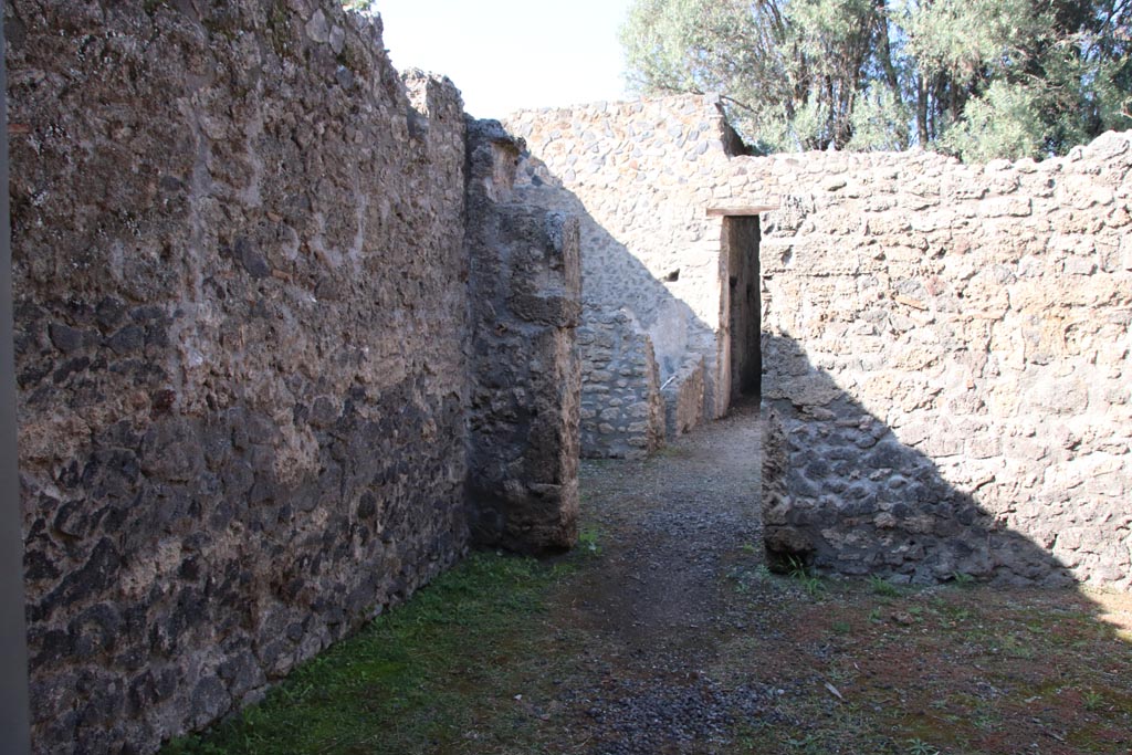 I.12.8 Pompeii. October 2022. Room 1, entrance room, looking north towards room 5. Photo courtesy of Klaus Heese.