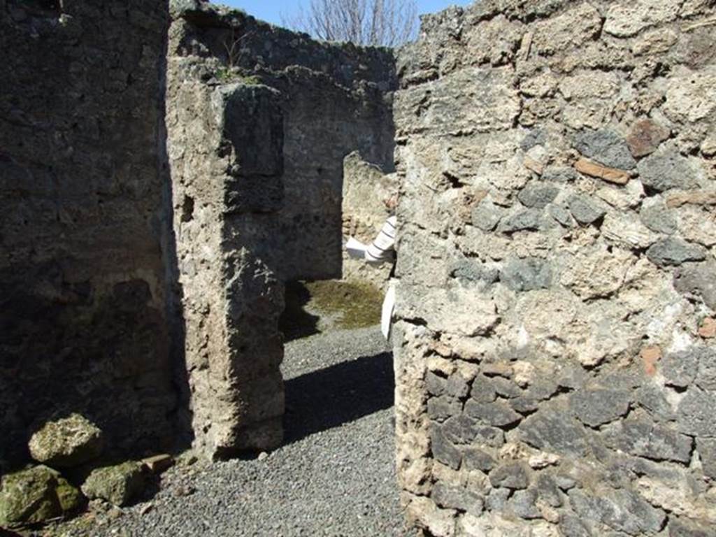 I.12.8 Pompeii.  March 2009.  Room 1.  North wall with door to room 5.