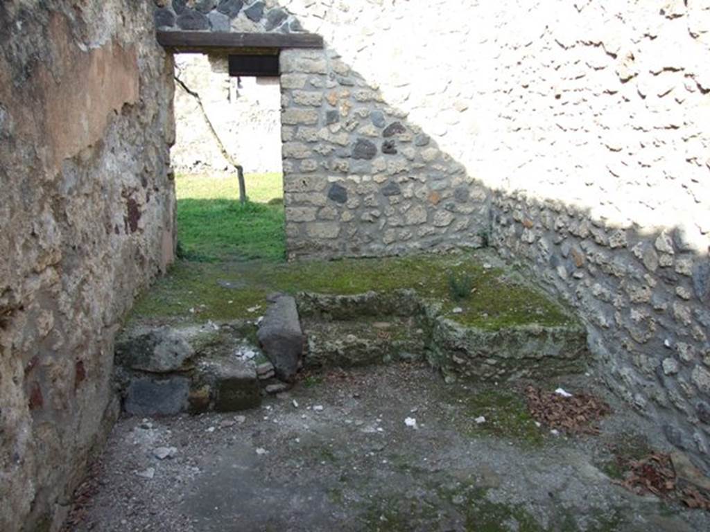 I.12.9 Pompeii. December 2007. Looking north to garden at I.12.14, across room in north-west corner.