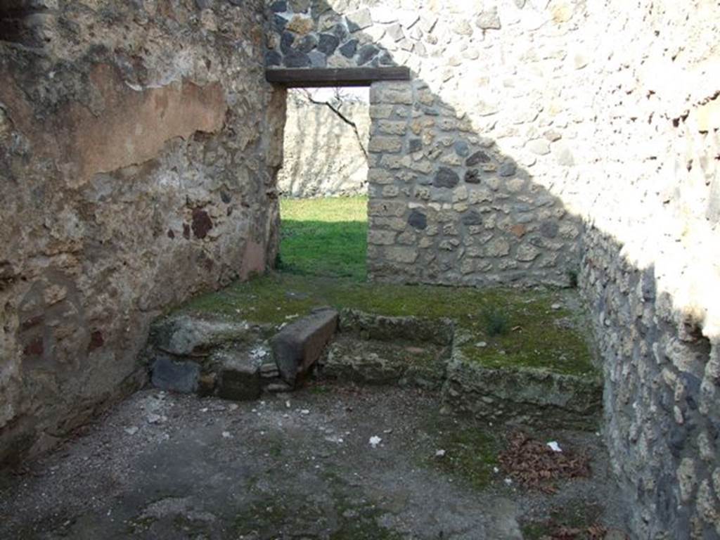 I.12.9 Pompeii. December 2007. Looking north to garden at I.12.14, across room in north-west corner.