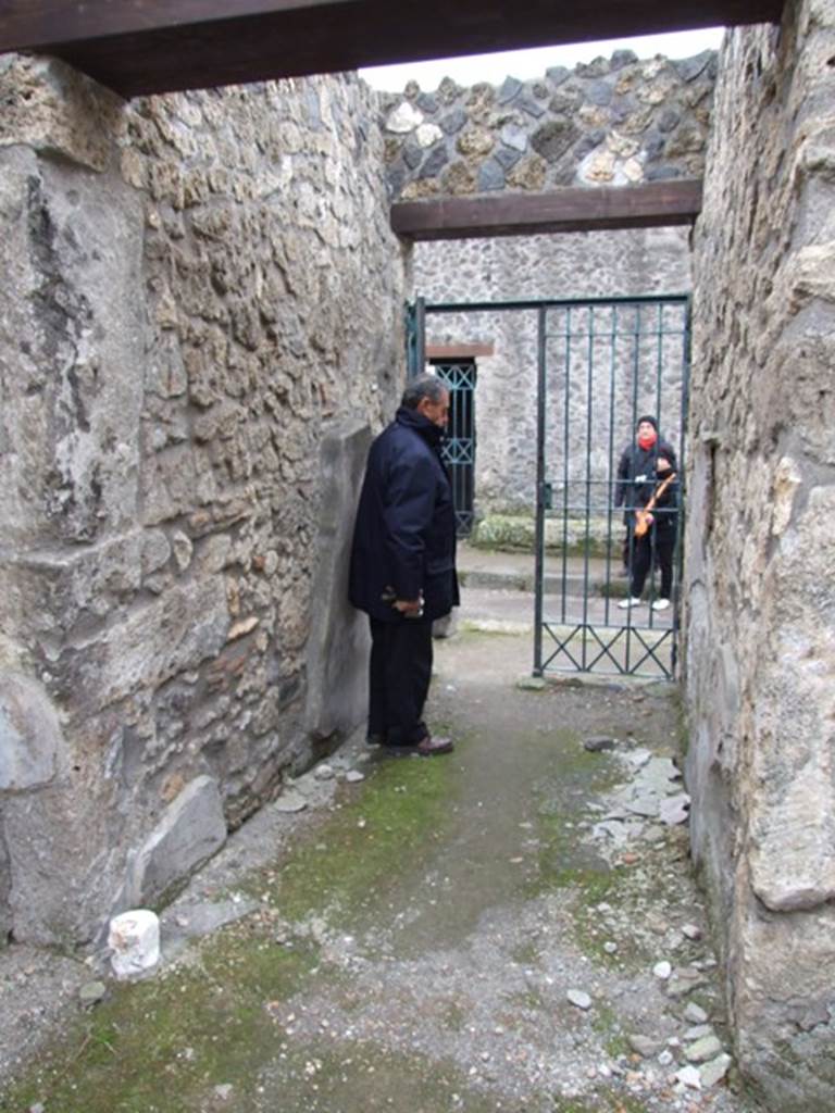 I.12.11 Pompeii. December 2007. Looking south along fauces or corridor towards entrance.