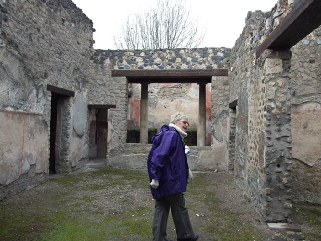 I.12.11.  December 2007.  Atrium, looking north to tablinum area with window overlooking garden.