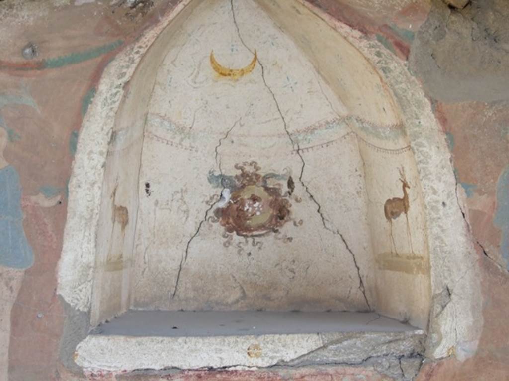 I.12.15 Pompeii. March 2009. Room 5, lararium niche painted with the head of Medusa, a garland, two stags and a crescent moon