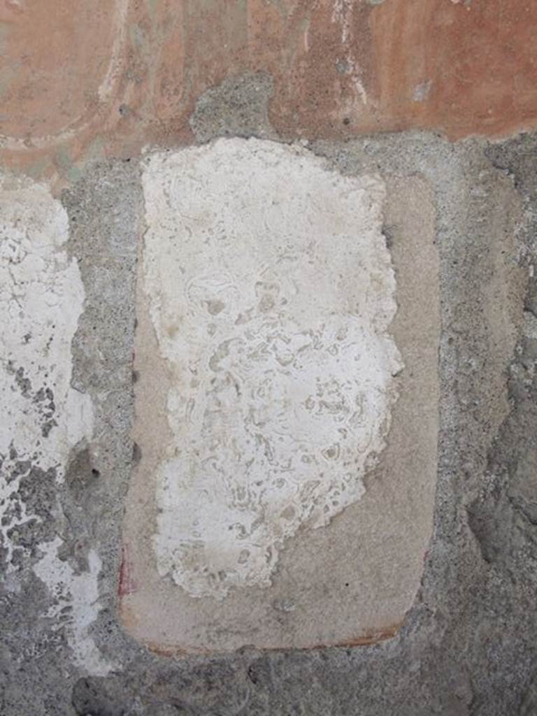 I.12.15 Pompeii. March 2009. Plaster beneath the niche.