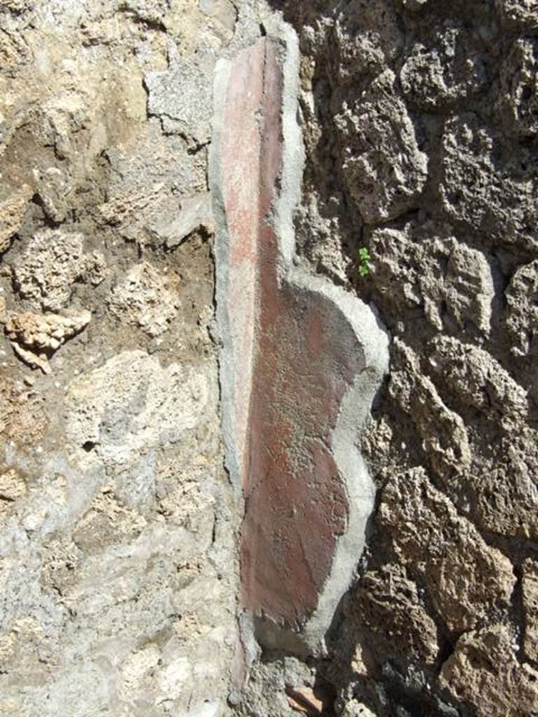 I.12.15 Pompeii.  March 2009.  Room 7.  Remains of painted plaster in north east corner