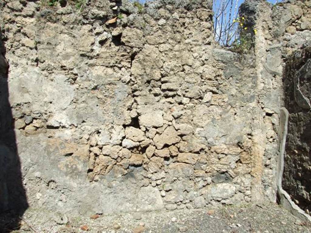 I.12.15 Pompeii. March 2009. Room 2, north wall with window overlooking garden area.