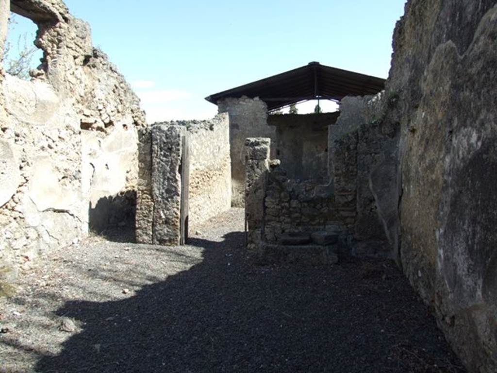 I.12.15 Pompeii. March 2009. Room 1, atrium. Looking east to room 4, doorway to corridor, and room 3, windowed triclinium.
