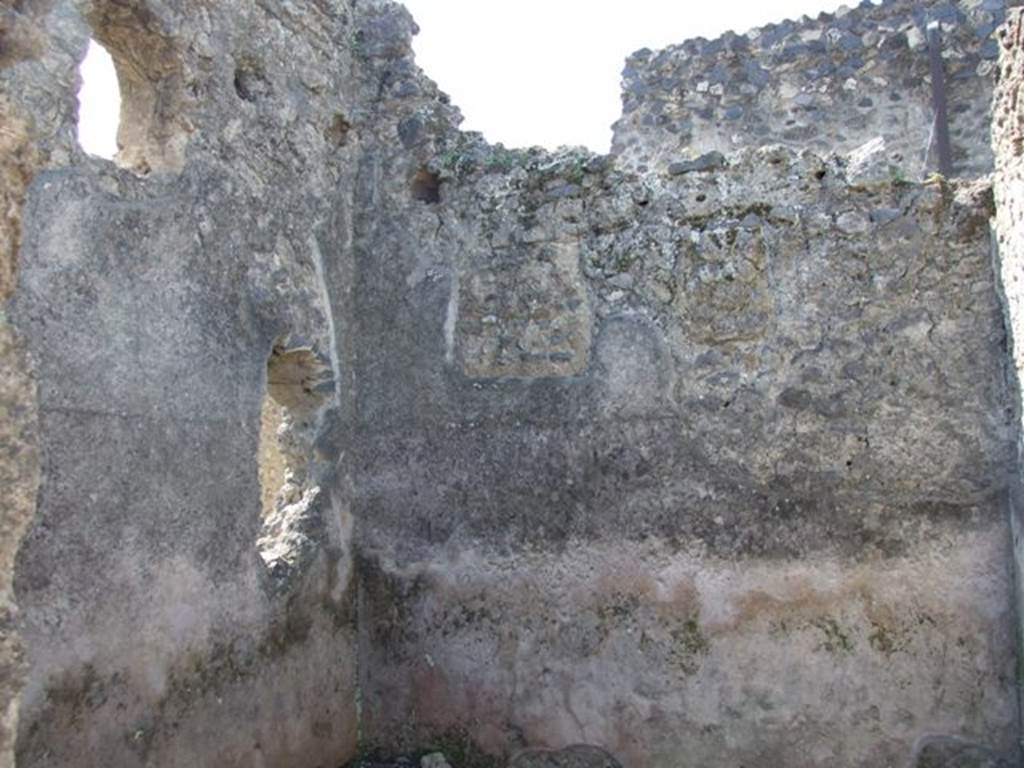 I.12.16 Pompeii.  March 2009.  Room 7.  West wall, and south west corner.