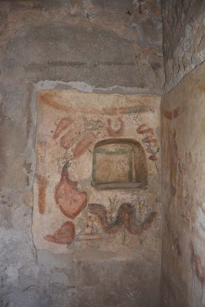 I.13.2 Pompeii. July 2018. North wall of kitchen with lararium in north-east corner.
Photo courtesy of Johannes Eber.

