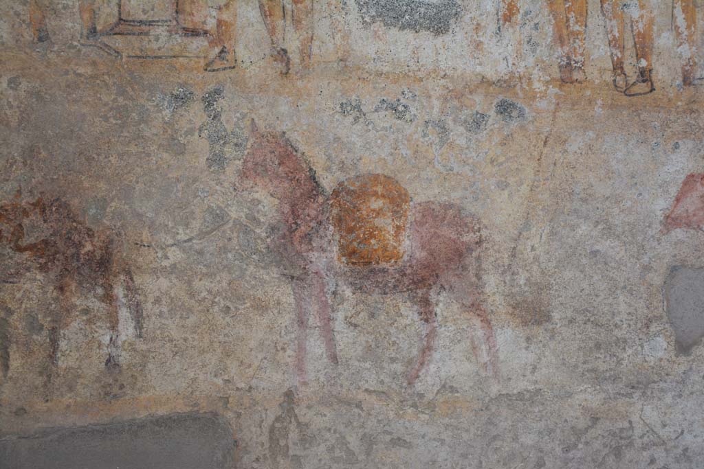 I.13.2 Pompeii. May 2010. East wall of kitchen with lararium painting showing the matron of the house with her entire family offering sacrifice at the Caristia, a ritual celebrating family and held on February 22. (Fig 35.1 on page 541).
See Dobbins, J & Foss, P., 2008. The World of Pompeii. New York: Routledge. (p.534)
