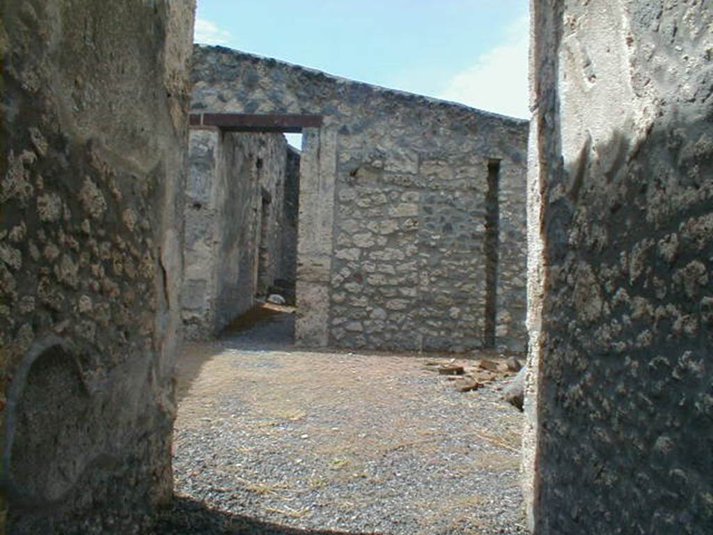 I.13.7 Pompeii. September 2004. Looking west across atrium, from entrance.