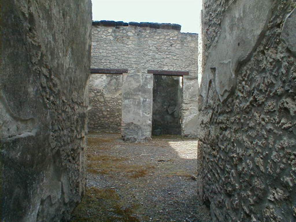 I.13.8 Pompeii. September 2004. Looking west across atrium, from ntrance.
