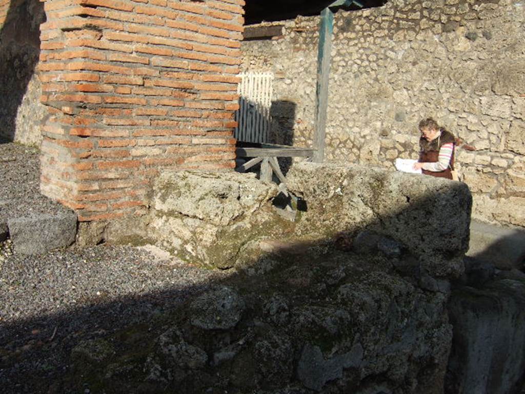 I.13.10 Pompeii. December 2005. Corner of vicolo at I.13.10, looking north-east from Via di Castricio.