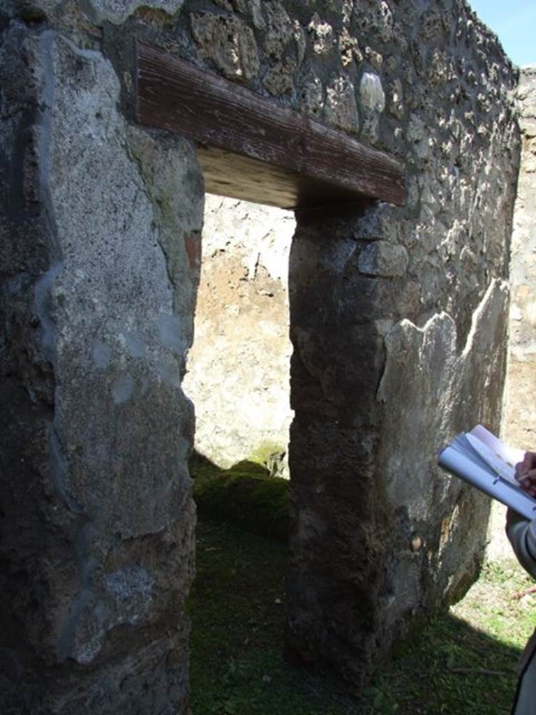 I.13.15 Pompeii. March 2009.  Doorway to Room on north side of entrance.  Looking west.