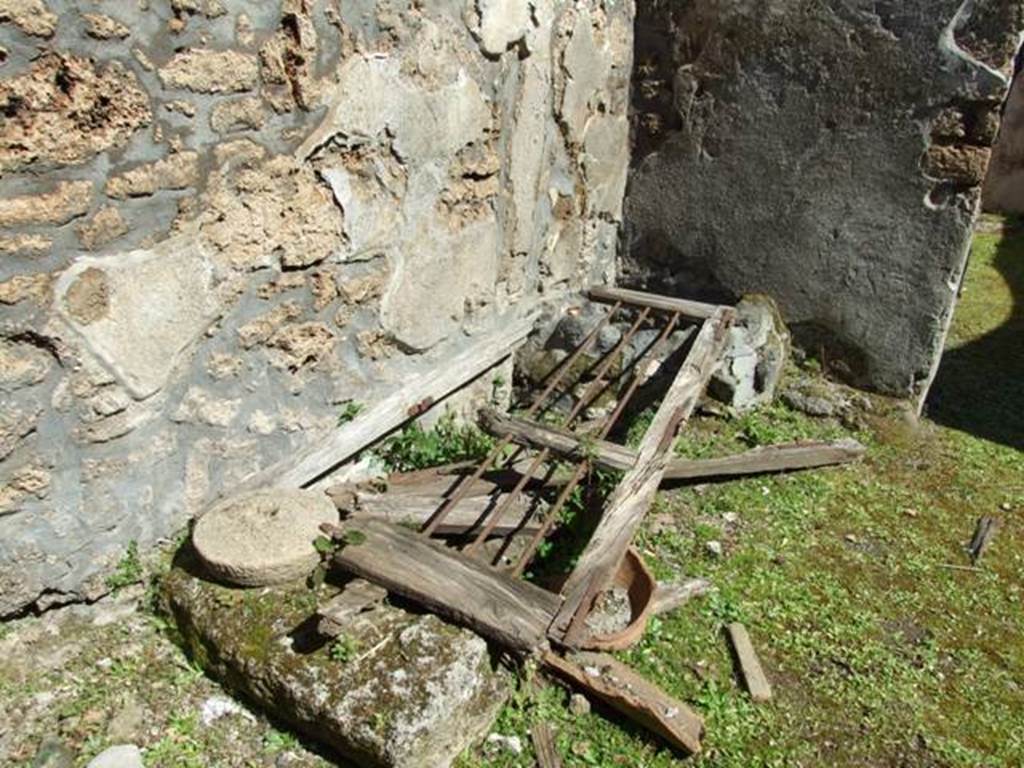 I.13.15 Pompeii. March 2009. North east corner with masonry remains, underneath rubbish.