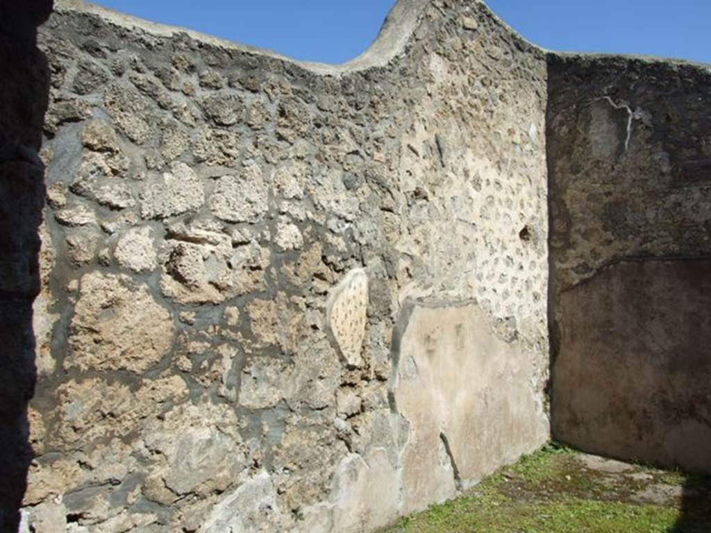 I.13.15 Pompeii. March 2009.  Room on north-east side of central courtyard, looking at north-east corner and north wall.
