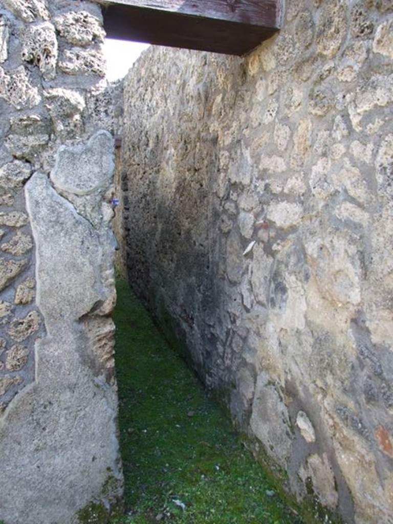 I.13.15 Pompeii. March 2009.  Doorway to corridor on east wall, at south end.