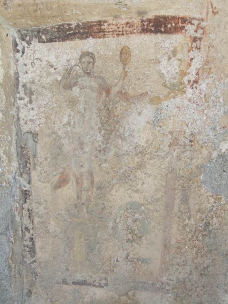 I.13.16 Pompeii.  March 2009. North wall.  Painting of Venus with mirror and remains of a statue of Priapus on a tall pedestal, on the right.

