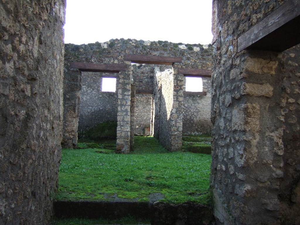 I.14.3  Pompeii. December 2004. On the left, the doorway to the oecus.