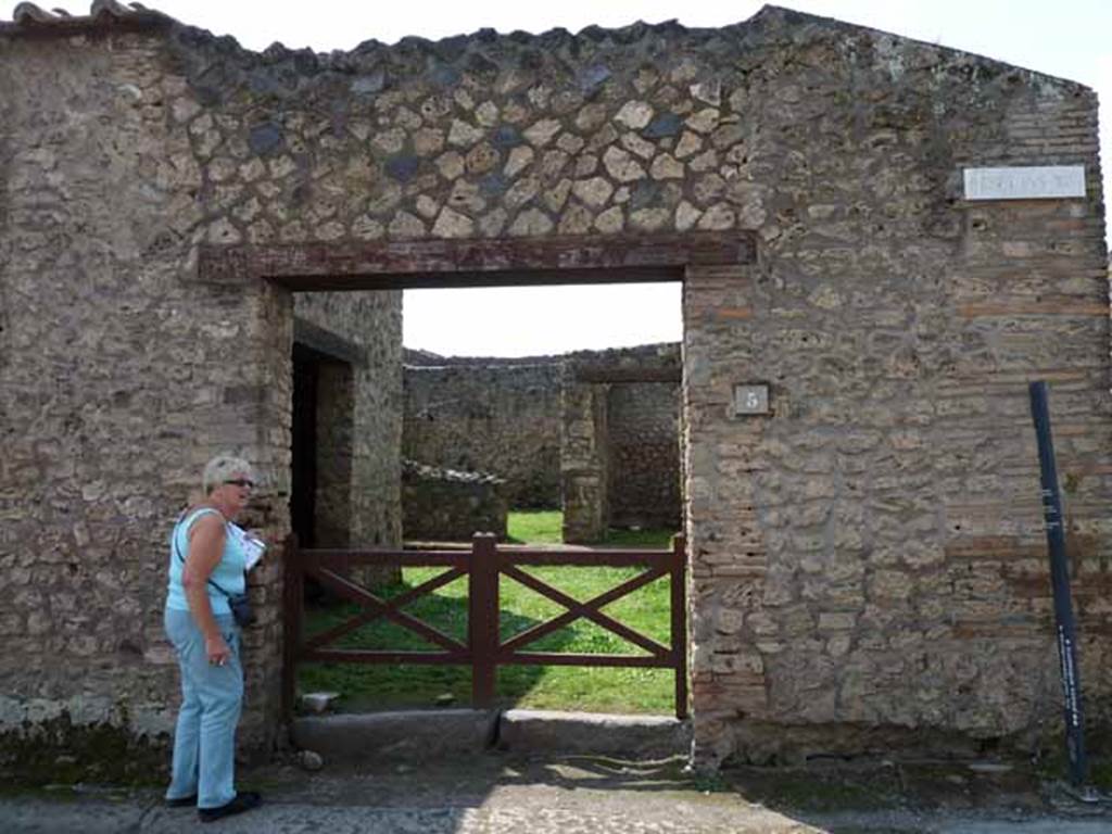 I.14.5 Pompeii. May 2010. Entrance doorway, looking west.