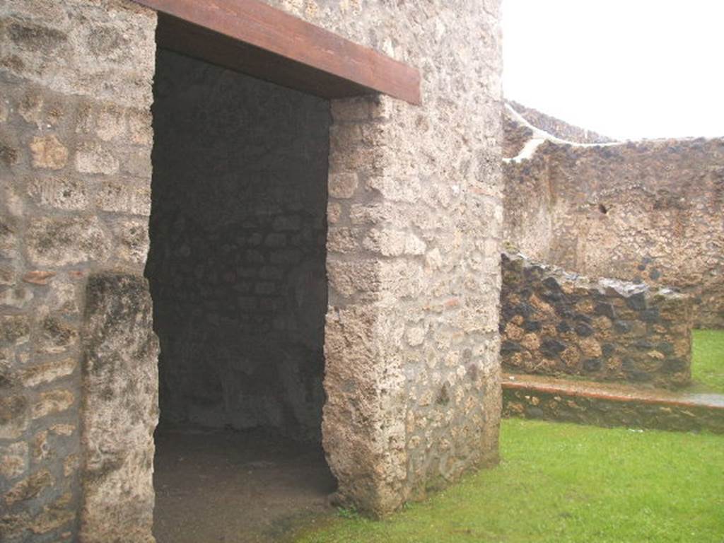 I.14.5 Pompeii. December 2004. Doorway to triclinium on south side of entrance doorway.