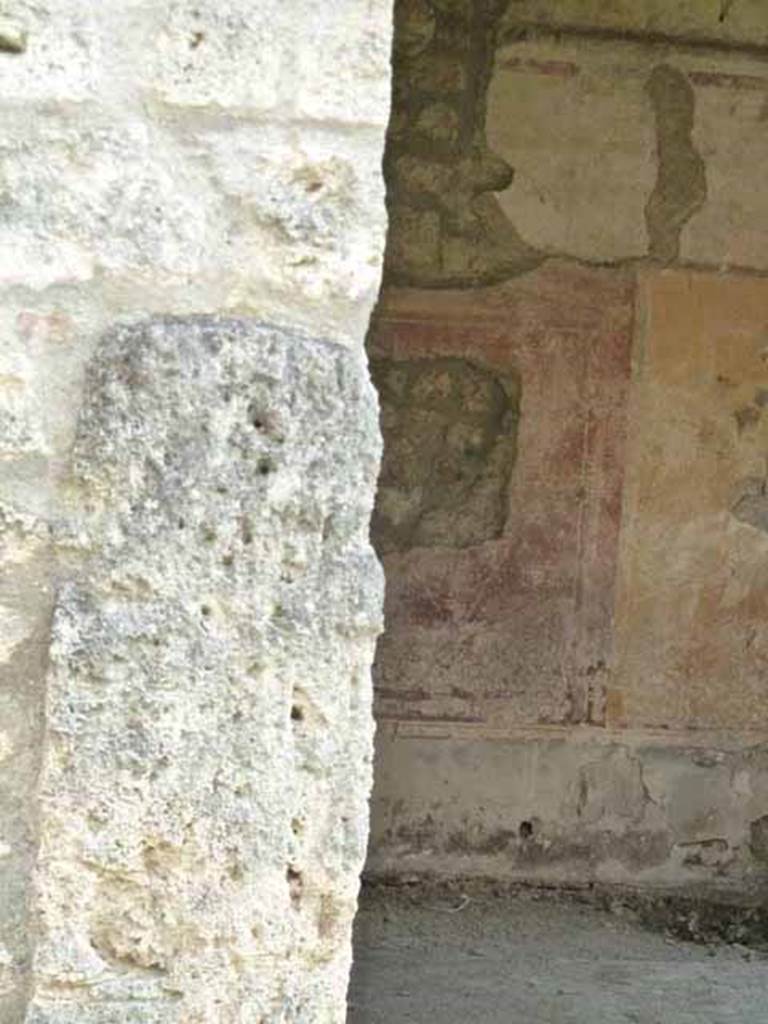 I.14.5  Pompeii. May 2010. Doorway to triclinium, and south wall.