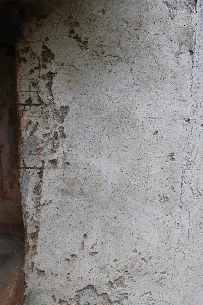 I.14.7 Pompeii. December 2018. 
West wall of the garden area, detail of the wall at its northern end. Photo courtesy of Aude Durand.
