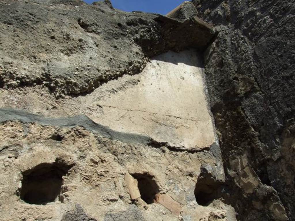 I.14.7 Pompeii.  March 2009. Remains of plaster and holes for flooring of upper floor.